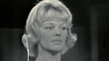 Movie still from “Stories We Tell” (2012), directed by Sarah Polley – A black and white photo of a woman's face; Close Up shot, Low angle