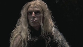 Movie still from “Stories We Tell” (2012), directed by Sarah Polley – A person with long blonde hair; Close Up shot, Low angle