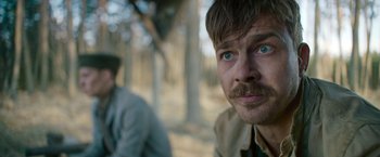 Movie still from “All Quiet on the Western Front” (2022), directed by Edward Berger – Close Up shot, Over the shoulder angle