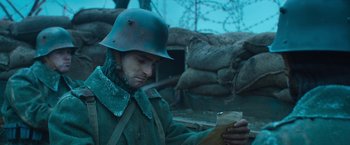 Movie still from “All Quiet on the Western Front” (2022), directed by Edward Berger – Close Up shot, High angle
