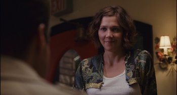 Movie still from “Stranger Than Fiction” (2006), directed by Marc Forster – A person sitting in front of a mirror; Close Up shot, Over the shoulder angle