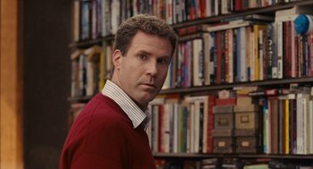 Movie still from “Stranger Than Fiction” (2006), directed by Marc Forster – A man standing in front of a book shelf; Close Up shot, Over the shoulder angle