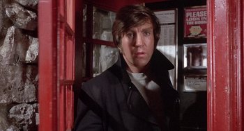 Movie still from “Straw Dogs” (1971), directed by Sam Peckinpah – A person wearing a jacket; Close Up shot, Low angle