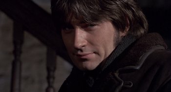 Movie still from “Straw Dogs” (1971), directed by Sam Peckinpah – A person wearing a jacket; Close Up shot, Low angle