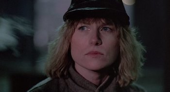 Movie still from “Streets of Fire” (1984), directed by Walter Hill – A person wearing a hat; Close Up shot, Low angle