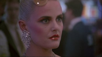 Movie still from “Strictly Ballroom” (1992), directed by Baz Luhrmann – A person wearing a costume; Close Up shot, Over the shoulder angle