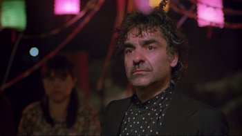 Movie still from “Strictly Ballroom” (1992), directed by Baz Luhrmann – A man in a polka dot shirt and a woman in a polka dot dress; Close Up shot, Low angle