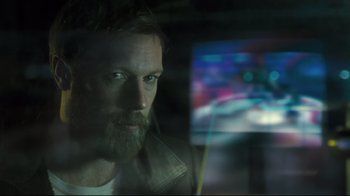 Movie still from “Submarino” (2010), directed by Thomas Vinterberg – A man with a long beard is looking at the camera; Close Up shot, Over the shoulder angle