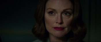 Movie still from “Suburbicon” (2017), directed by George Clooney – A person wearing a white shirt; Close Up shot, Low angle