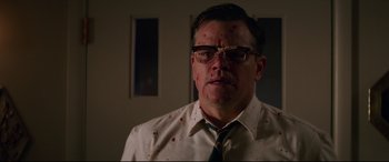 Movie still from “Suburbicon” (2017), directed by George Clooney – A man in a white dress shirt and tie with blood all over his face; Close Up shot, Low angle