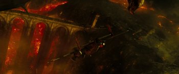 Movie still from “Sucker Punch” (2011), directed by Zack Snyder – An image of an airplane flying in the sky at night; Extreme Wide shot, High angle