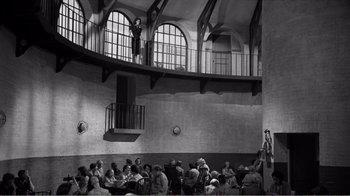 Movie still from “Suddenly, Last Summer” (1959), directed by Joseph L. Mankiewicz – A group of people sitting around a room; Extreme Wide shot, Low angle