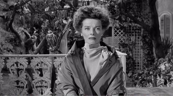 Movie still from “Suddenly, Last Summer” (1959), directed by Joseph L. Mankiewicz – An old photo of a woman with a bird in the background; Close Up shot, Low angle