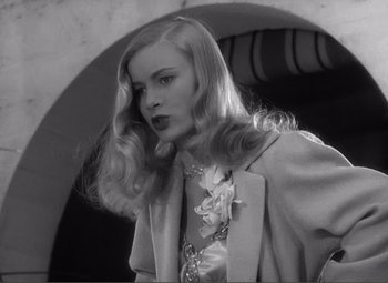 Movie still from “Sullivan's Travels” (1941), directed by Preston Sturges – A black and white photo of a woman with long blonde hair; Close Up shot, Low angle