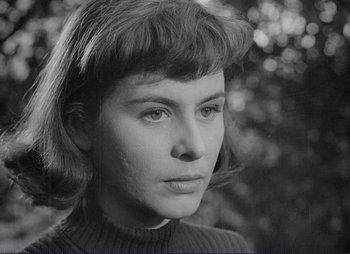 Movie still from “Summer Interlude” (1951), directed by Ingmar Bergman – A black - and - white photo of a young woman; Close Up shot, High angle