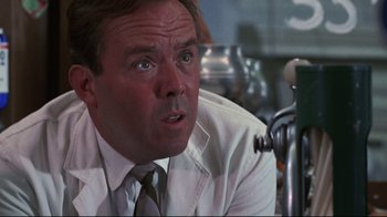 Movie still from “Summer of '42” (1971), directed by Robert Mulligan – A person wearing a shirt and tie; Close Up shot, Low angle