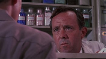 Movie still from “Summer of '42” (1971), directed by Robert Mulligan – A person in a room; Close Up shot, Over the shoulder angle