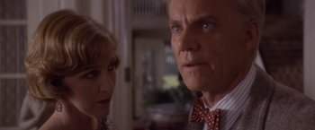 Movie still from “Sunset” (1988), directed by Blake Edwards – A man and a woman looking at each other; Close Up shot, Over the shoulder angle