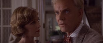 Movie still from “Sunset” (1988), directed by Blake Edwards – A man and a woman looking into each other's eyes; Close Up shot, Low angle