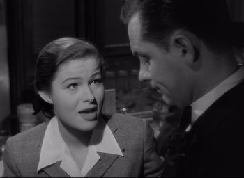 Movie still from “Sunset Blvd.” (1950), directed by Billy Wilder – A man and a woman talking to each other; Close Up shot, Over the shoulder angle