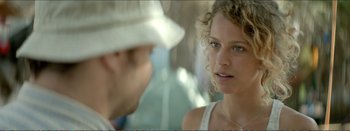 Movie still from “Suntan” (2016), directed by Argyris Papadimitropoulos – A man and a woman talking to each other; Close Up shot, Over the shoulder angle