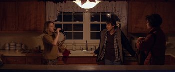 Movie still from “Super Dark Times” (2017), directed by Kevin Phillips – A man and a woman standing in front of each other; Medium shot, Over the shoulder angle