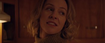 Movie still from “Super Dark Times” (2017), directed by Kevin Phillips – A woman's face in a sweater; Close Up shot, Low angle