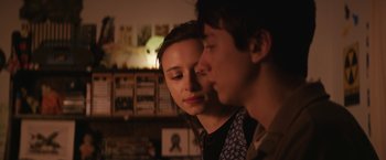 Movie still from “Super Dark Times” (2017), directed by Kevin Phillips – A man and a woman looking at one another; Close Up shot, Over the shoulder angle