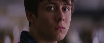 Movie still from “Super Dark Times” (2017), directed by Kevin Phillips – A person looking at the camera; Close Up shot, Over the shoulder angle
