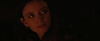 Movie still from “Super Dark Times” (2017), directed by Kevin Phillips – A woman's face in the dark; Close Up shot, Over the shoulder angle