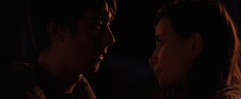 Movie still from “Super Dark Times” (2017), directed by Kevin Phillips – A man and a woman face to face in the dark; Close Up shot, Over the shoulder angle