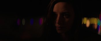 Movie still from “Super Dark Times” (2017), directed by Kevin Phillips – A woman's face in the dark; Close Up shot, Over the shoulder angle