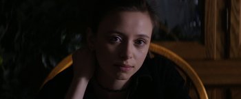 Movie still from “Super Dark Times” (2017), directed by Kevin Phillips – A person sitting in a chair; Close Up shot, Low angle
