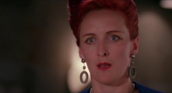 Movie still from “Super Mario Bros.” (1993), directed by Annabel Jankel – A person with red hair; Close Up shot, Low angle