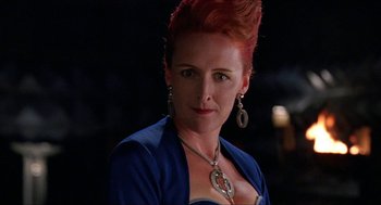 Movie still from “Super Mario Bros.” (1993), directed by Annabel Jankel – A person wearing a blue jacket; Close Up shot, Low angle