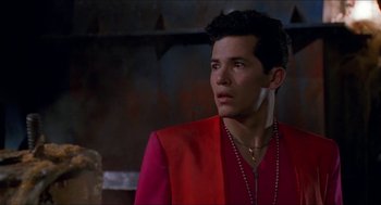 Movie still from “Super Mario Bros.” (1993), directed by Annabel Jankel – A man in a red jacket looking to his left; Close Up shot, Low angle
