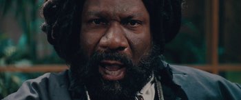 Movie still from “Surrogates” (2009), directed by Jonathan Mostow – A person with a beard; Extreme Close Up shot, Low angle