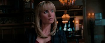 Movie still from “Surrogates” (2009), directed by Jonathan Mostow – A woman with blonde hair and blue eyes looking to her left; Close Up shot, Low angle