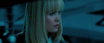 Movie still from “Surrogates” (2009), directed by Jonathan Mostow – A person with blond hair; Close Up shot, Over the shoulder angle