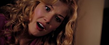 Movie still from “Surrogates” (2009), directed by Jonathan Mostow – A woman's face as she stares at the camera; Close Up shot, Overhead angle