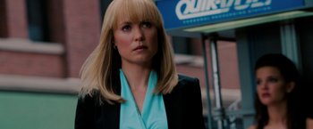 Movie still from “Surrogates” (2009), directed by Jonathan Mostow – A woman with blonde hair wearing a black jacket; Close Up shot, Over the shoulder angle