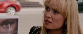 Movie still from “Surrogates” (2009), directed by Jonathan Mostow – A woman's face with long blond hair; Close Up shot, Over the shoulder angle