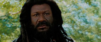 Movie still from “Surrogates” (2009), directed by Jonathan Mostow – A person with a beard; Close Up shot, Low angle