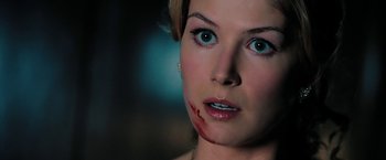 Movie still from “Surrogates” (2009), directed by Jonathan Mostow – A person with blood on her face; Close Up shot, Over the shoulder angle