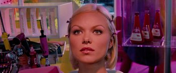 Movie still from “Surrogates” (2009), directed by Jonathan Mostow – A person wearing a wig; Close Up shot, Over the shoulder angle