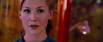 Movie still from “Surrogates” (2009), directed by Jonathan Mostow – A person wearing a blue shirt; Close Up shot, Over the shoulder angle
