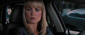Movie still from “Surrogates” (2009), directed by Jonathan Mostow – A person sitting in a car; Close Up shot, Over the shoulder angle