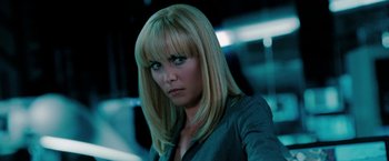 Movie still from “Surrogates” (2009), directed by Jonathan Mostow – A woman with blonde hair and a blue eye; Close Up shot, Low angle