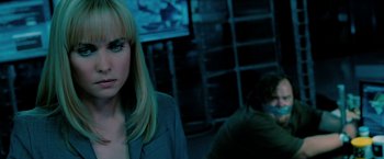 Movie still from “Surrogates” (2009), directed by Jonathan Mostow – A woman with blonde hair and blue eye shadow; Close Up shot, Over the shoulder angle
