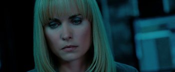 Movie still from “Surrogates” (2009), directed by Jonathan Mostow – A person with blond hair; Close Up shot, Over the shoulder angle